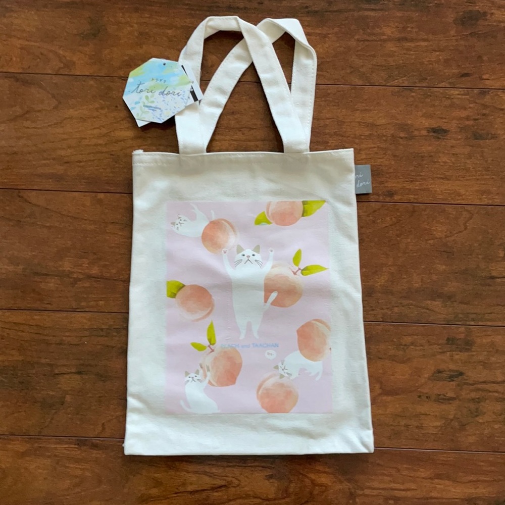 Mini peach cat tote bag from Tori Dori